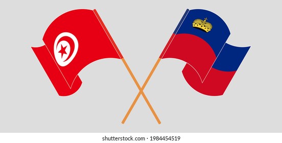 Crossed and waving flags of Tunisia and Liechtenstein