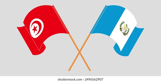 Banderas cruzadas y ondeando de Túnez y la República de Guatemala. Ilustración vectorial
