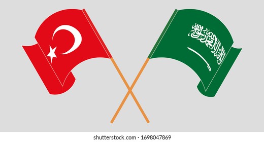 Cruzados y ondeando banderas de Turquía y el Reino de Arabia Saudita