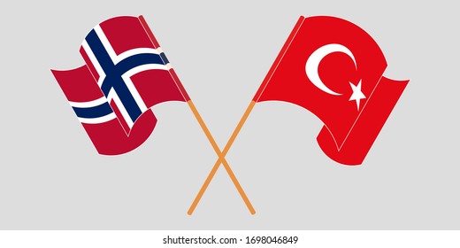 Crossed and waving flags of Turkey and Norway