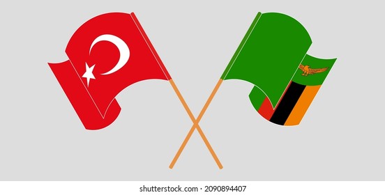 Crossed and waving flags of Turkey and Republic of Zambia