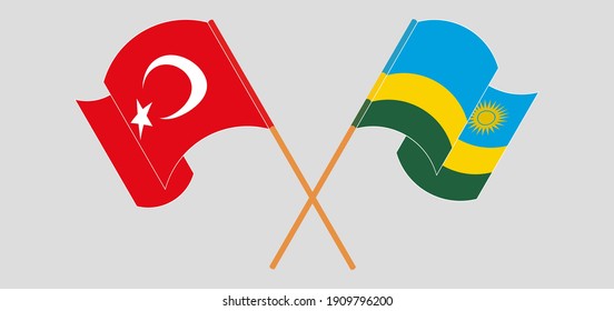 Crossed and waving flags of Turkey and Rwanda