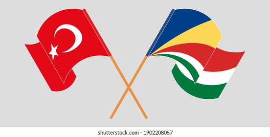 Crossed and waving flags of Turkey and Seychelles