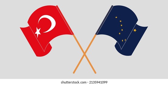 Crossed and waving flags of Turkey and the State of Alaska. Vector illustration
