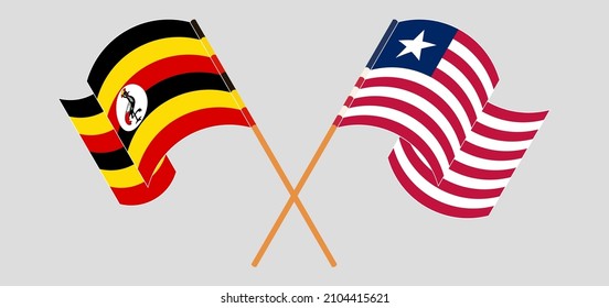 Crossed and waving flags of Uganda and Liberia. Vector illustration
