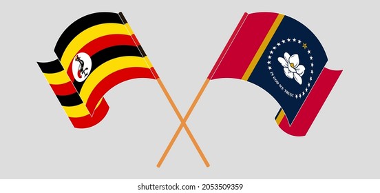 Crossed and waving flags of Uganda and the State of Mississippi