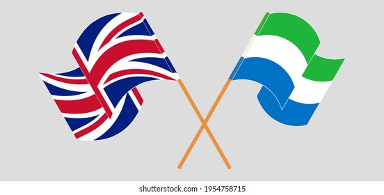 Crossed and waving flags of the UK and Sierra Leone