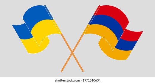 Crossed and waving flags of the Ukraine and Armenia