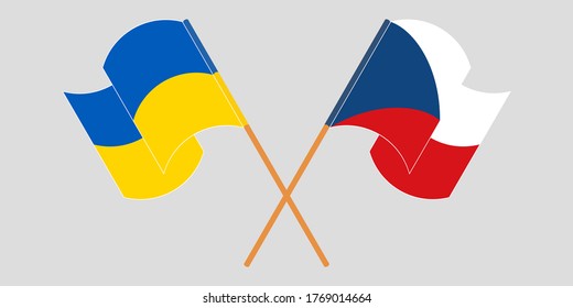Crossed and waving flags of the Ukraine and Czech Republic