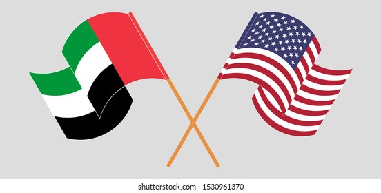 Crossed and waving flags of United Arab Emirates and the USA