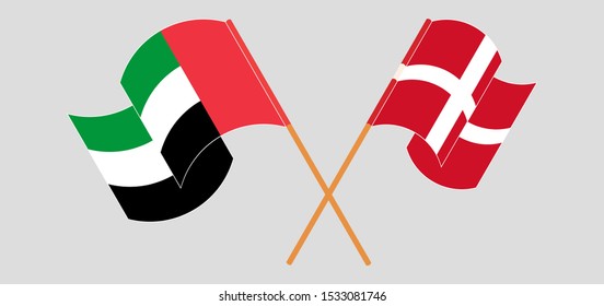 Crossed and waving flags of the United Arab Emirates and Denmark. Vector illustration
