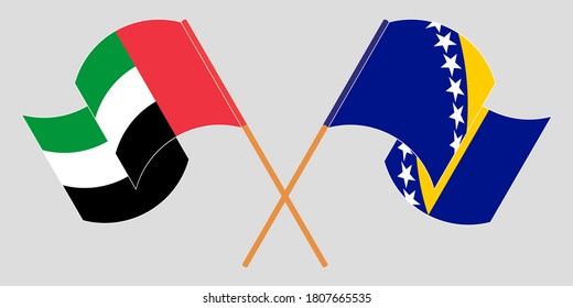 Crossed and waving flags of the United Arab Emirates and Bosnia and Herzegovina