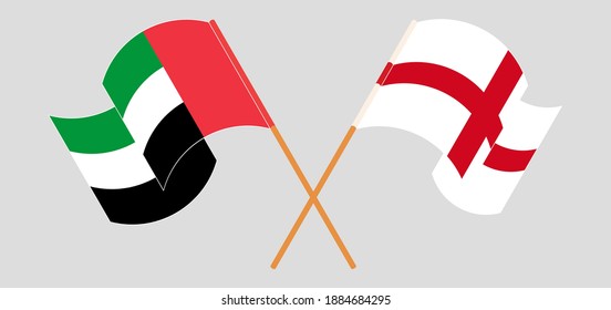 Crossed and waving flags of the United Arab Emirates and England