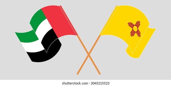 Crossed and waving flags of the United Arab Emirates and the State of New Mexico