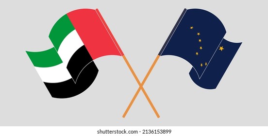 Crossed and waving flags of the United Arab Emirates and the State of Alaska. Vector illustration
