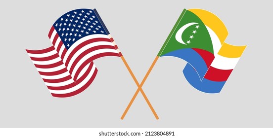 Crossed and waving flags of the USA and Comoros. Vector illustration
