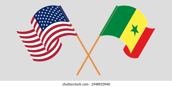 Crossed and waving flags of the USA and Senegal