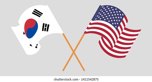 Crossed and waving flags of the USA and South Korea
