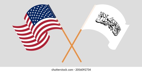 Crossed and waving flags of the USA and Taliban