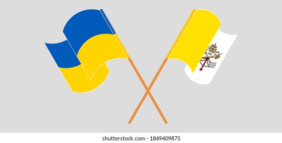 Crossed and waving flags of Vatican and the Ukraine