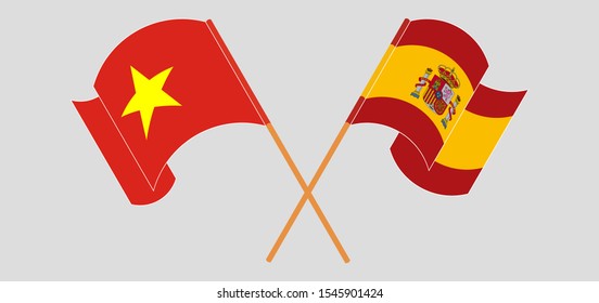 Crossed and waving flags of Vietnam and Spain. Vector illustration
