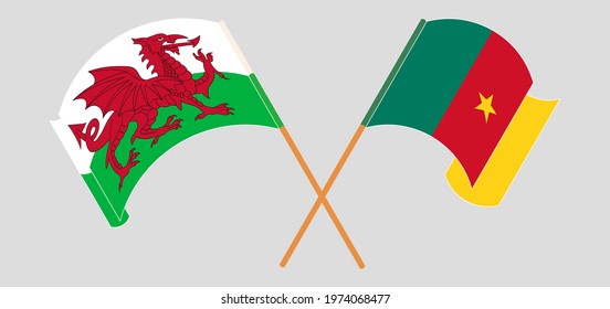 Crossed and waving flags of Wales and Cameroon