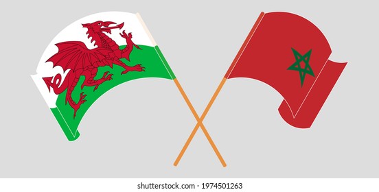 Crossed and waving flags of Wales and Morocco