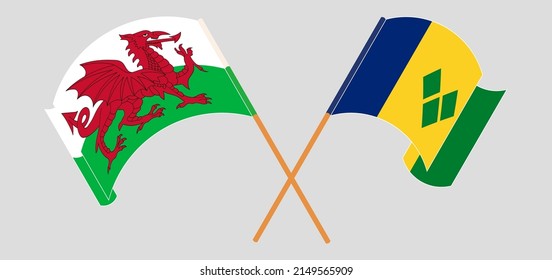 Crossed and waving flags of Wales and Saint Vincent and the Grenadines. Vector illustration