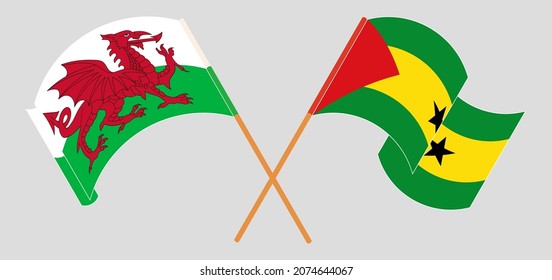 Crossed and waving flags of Wales and Sao Tome and Principe. Vector illustration