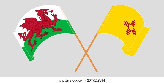 Crossed and waving flags of Wales and the State of New Mexico