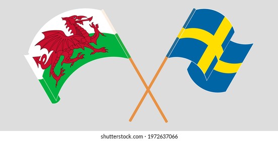 Crossed and waving flags of Wales and Sweden