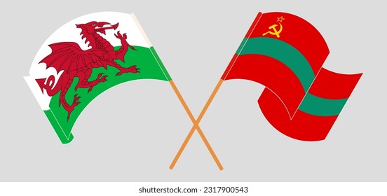 Crossed and waving flags of Wales and Transnistria. Vector illustration
