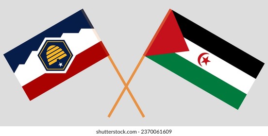 Crossed and waving flags of Western Sahara and The State of Utah. Vector illustration
