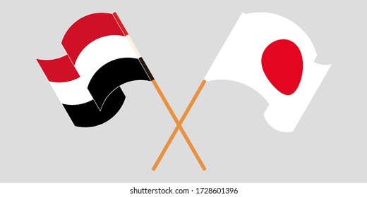 Crossed and waving flags of Yemen and Japan