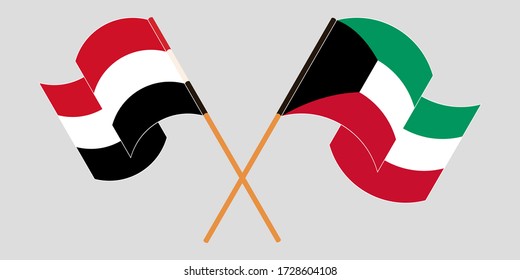 Crossed and waving flags of Yemen and Kuwait
