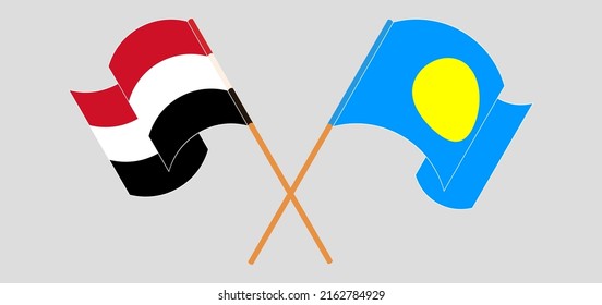 Crossed and waving flags of Yemen and Palau. Vector illustration
