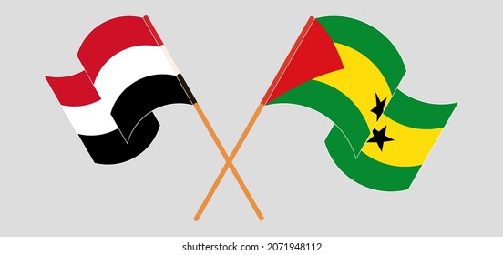 Crossed and waving flags of Yemen and Sao Tome and Principe