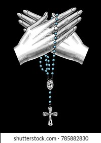 Crossed woman's hand with catholic prayer beads on black. Vintage engraving stylized drawing. Vector illustration