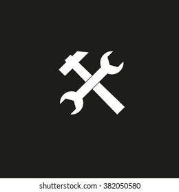 Crossed wrench and hammer. Vector icon white
