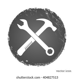 crossed wrench and hammer vector icon
