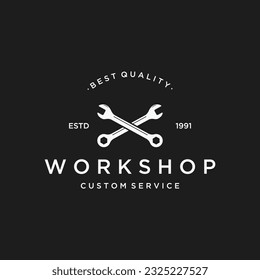 Crossed wrench logo design with vintage gear.Logo for workshop, badge, industrial,service or repair and mechanic.