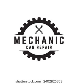 Crossed wrench logo design with vintage gear.Logo for workshop, badge, industrial,service or repair and mechanic.