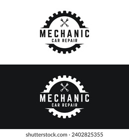 Crossed wrench logo design with vintage gear.Logo for workshop, badge, industrial,service or repair and mechanic.