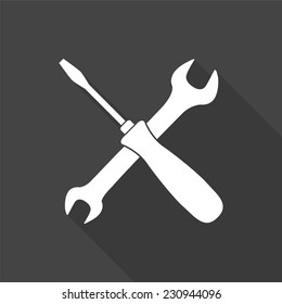 crossed wrench and screwdriver icon - vector illustration with long shadow isolated on gray 