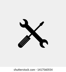 Crossed wrench and screwdriver vector icon 