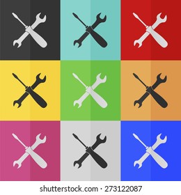 Crossed wrench and screwdriver vector icon - colored set. Flat design