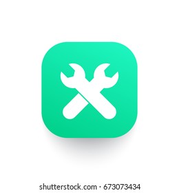 crossed wrenches icon on green shape