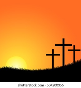 Crosses silhouette in the top of a mountain at sunset