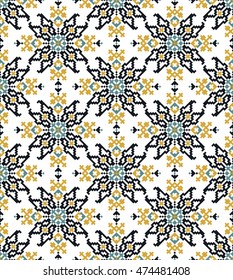 Cross-stitch blue and yellow seamless vector pattern