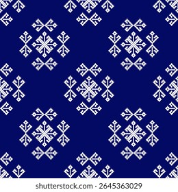 Cross-stitch seamless pattern on a blue background. Ukrainian traditional embroidery. Boho style. Tribal pattern. Vyshyvanka. Pixel art. Ideas for wallpaper and textiles. 